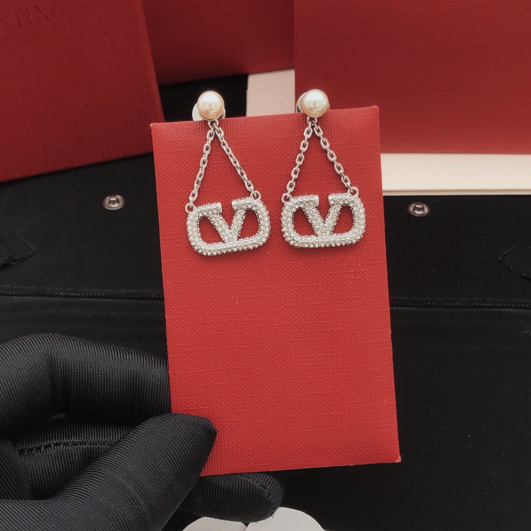 Signature Emblem Crystal-Accent Stud Earrings – Design 11 detail view