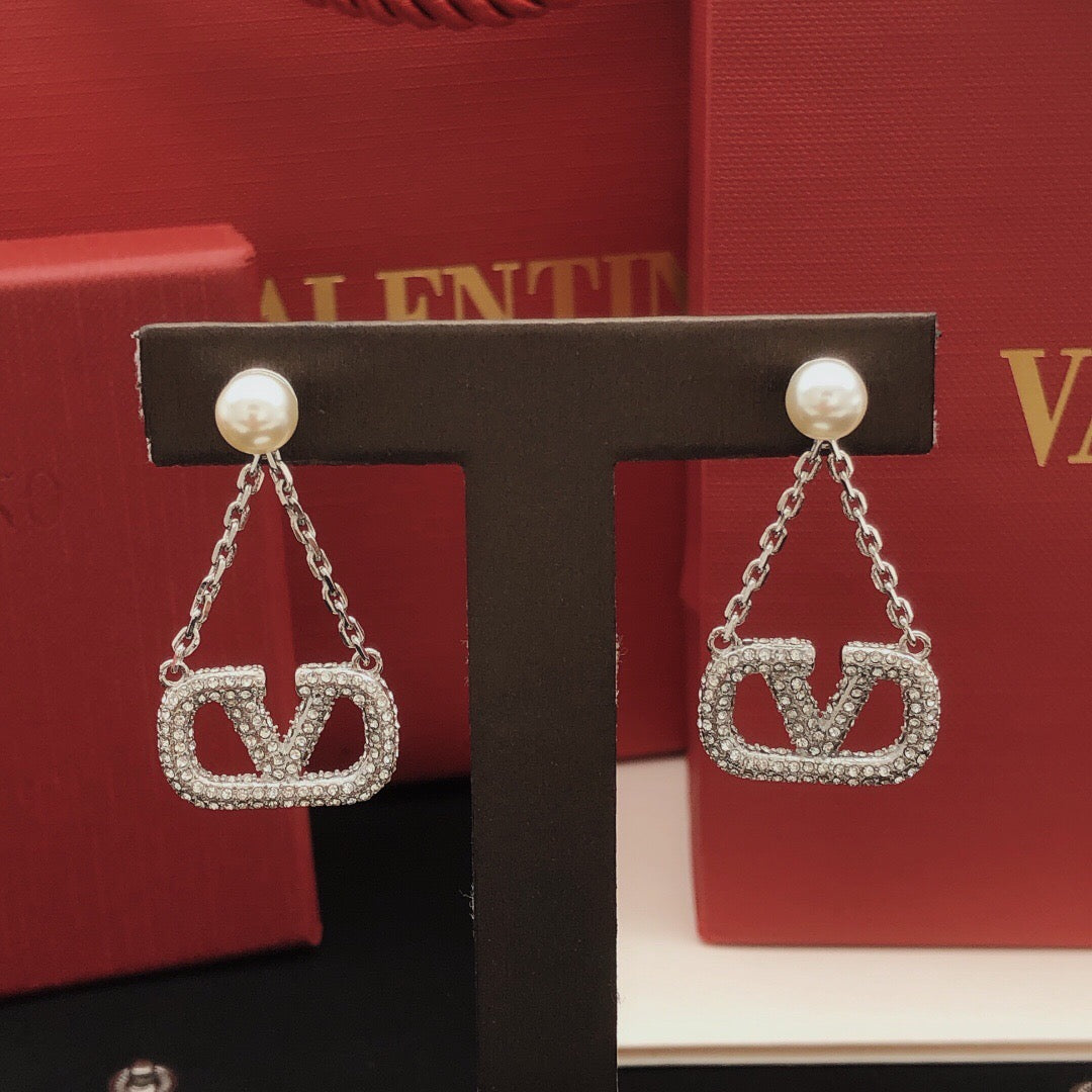 Signature Emblem Crystal-Accent Stud Earrings – Design 11 detail view