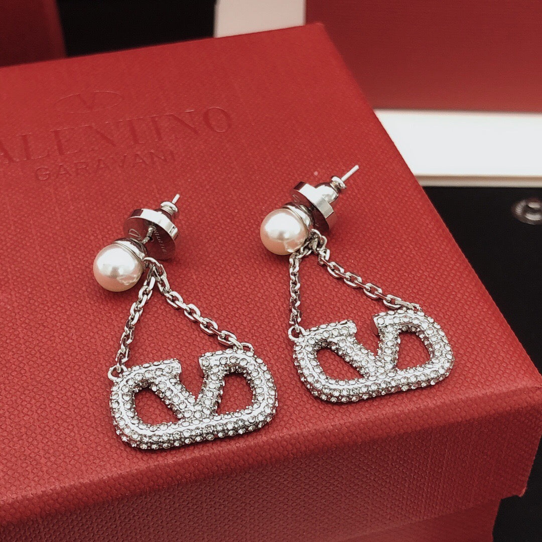 Signature Emblem Crystal-Accent Stud Earrings – Design 11 styled detail