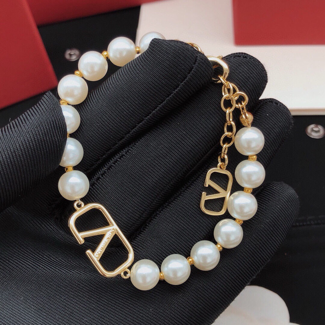 Signature Emblem Bracelet in Gold-Tone – Design 09 front view