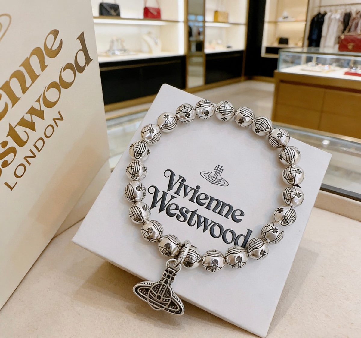 Orb-Inspired Emblem Bracelet in Silver-Tone – Vintage Detail – Design 018 styled product view
