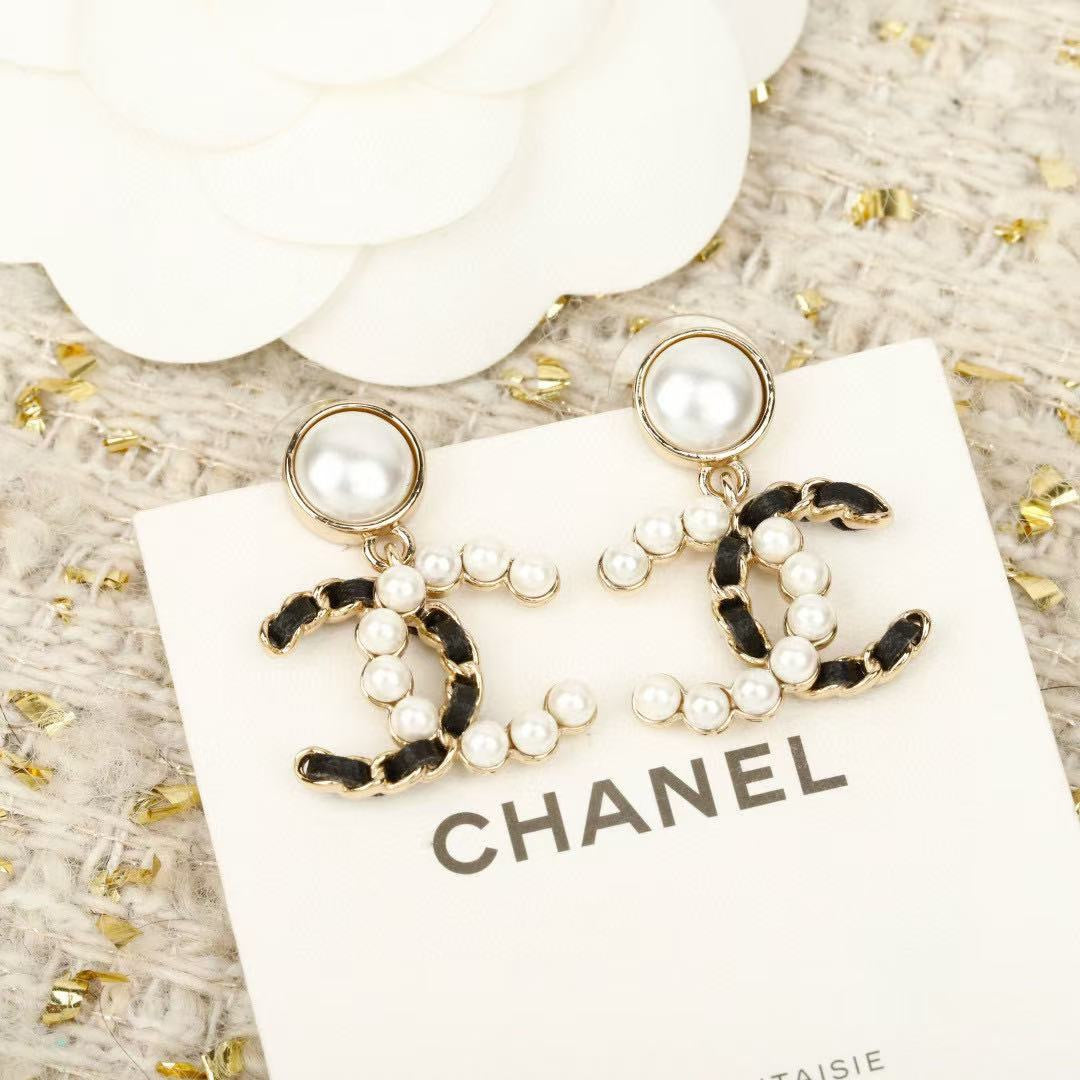 Signature Emblem Crystal-Accent Stud Earrings – Red Detail – Design 008 close-up detail