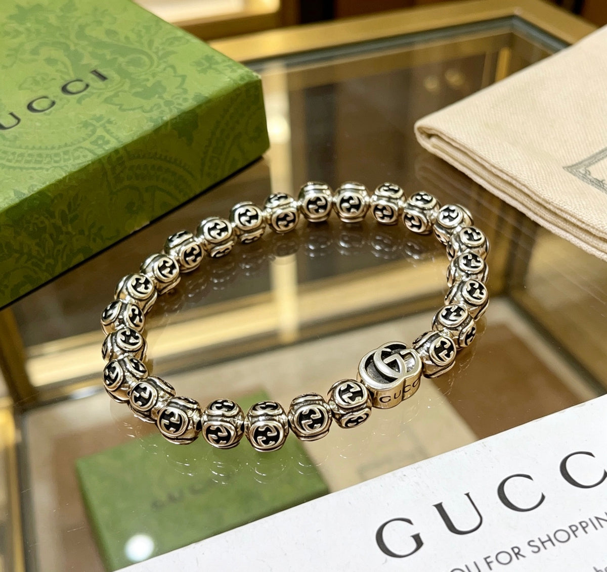 Double-G Emblem Bracelet in Polished Metal-Tone – Design 033 detail view