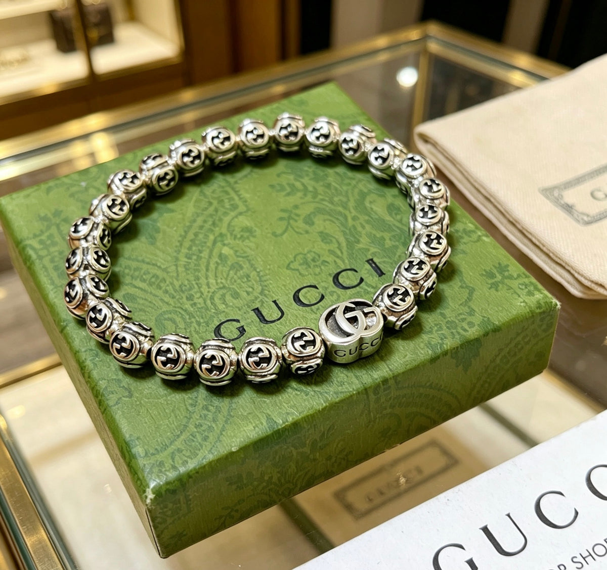 Double-G Emblem Bracelet in Polished Metal-Tone – Design 019 front product view