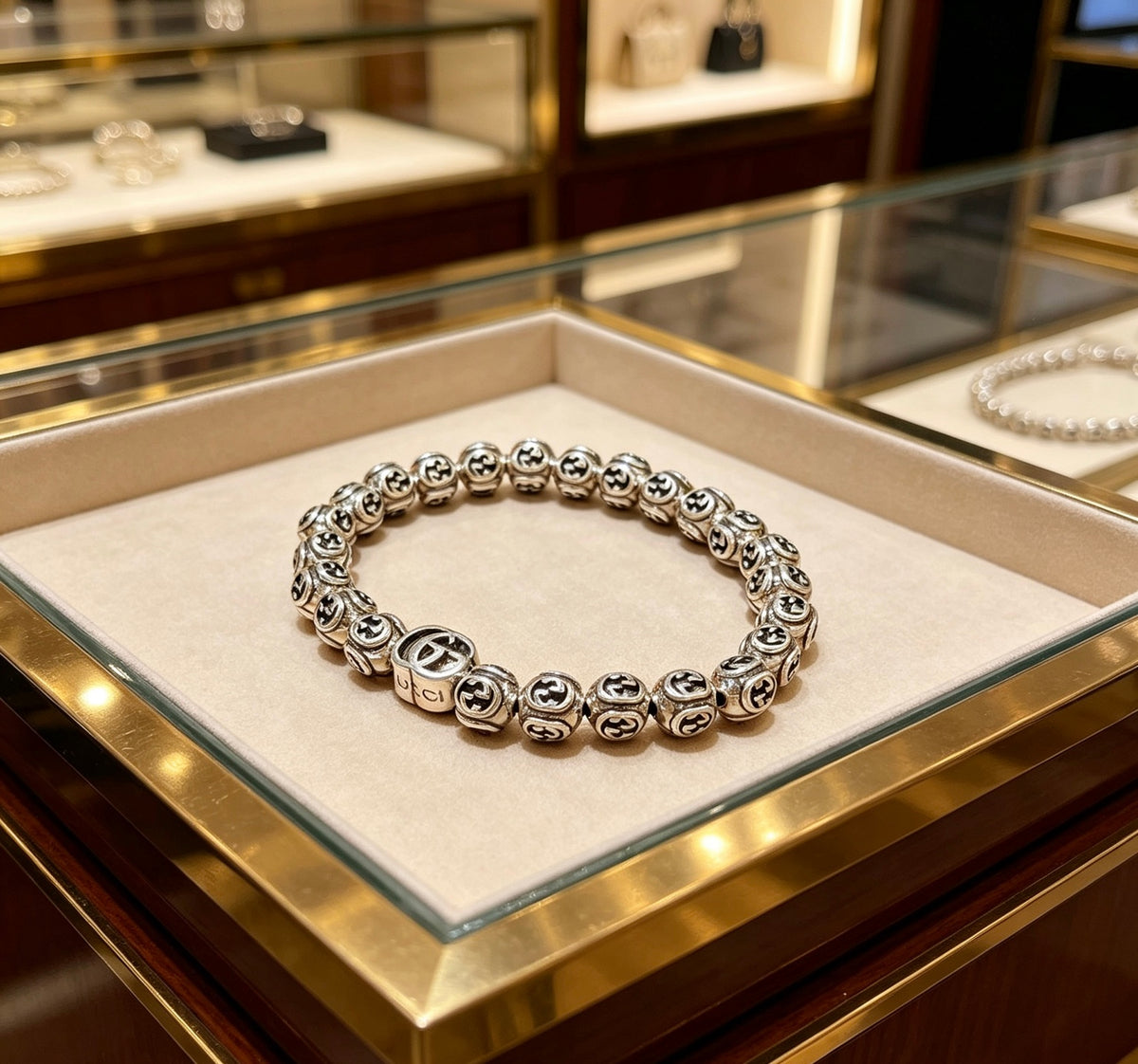 Double-G Emblem Bracelet in Polished Metal-Tone – Design 033 close-up detail