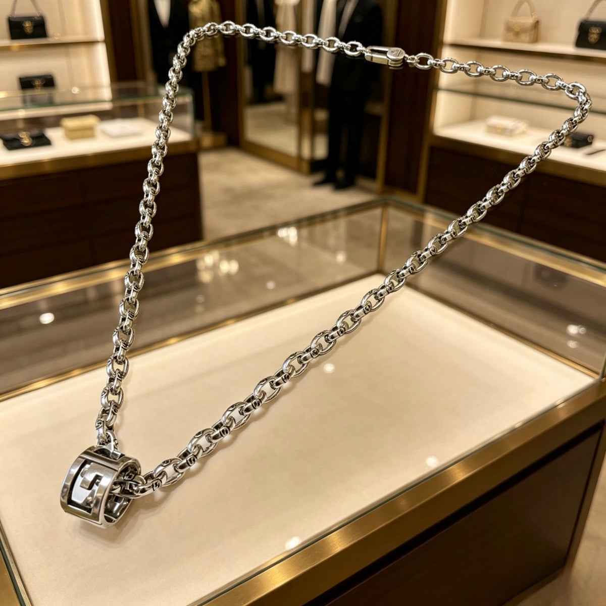 Double-G Emblem Pendant Necklace in Polished Metal-Tone – Vintage Detail – Design 042 close-up detail