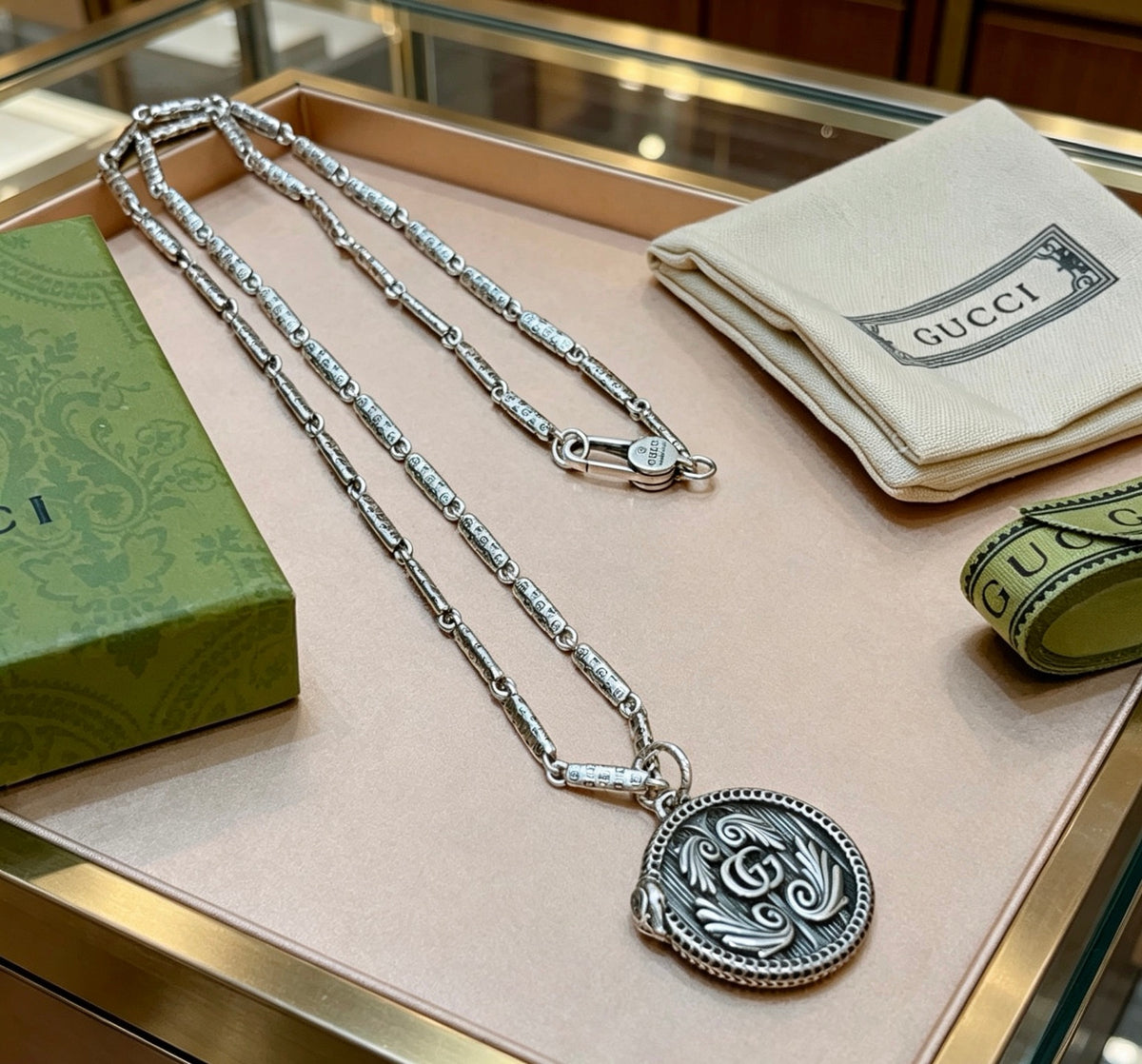 Double-G Emblem Pendant Necklace in Polished Metal-Tone – Design 153 close-up detail