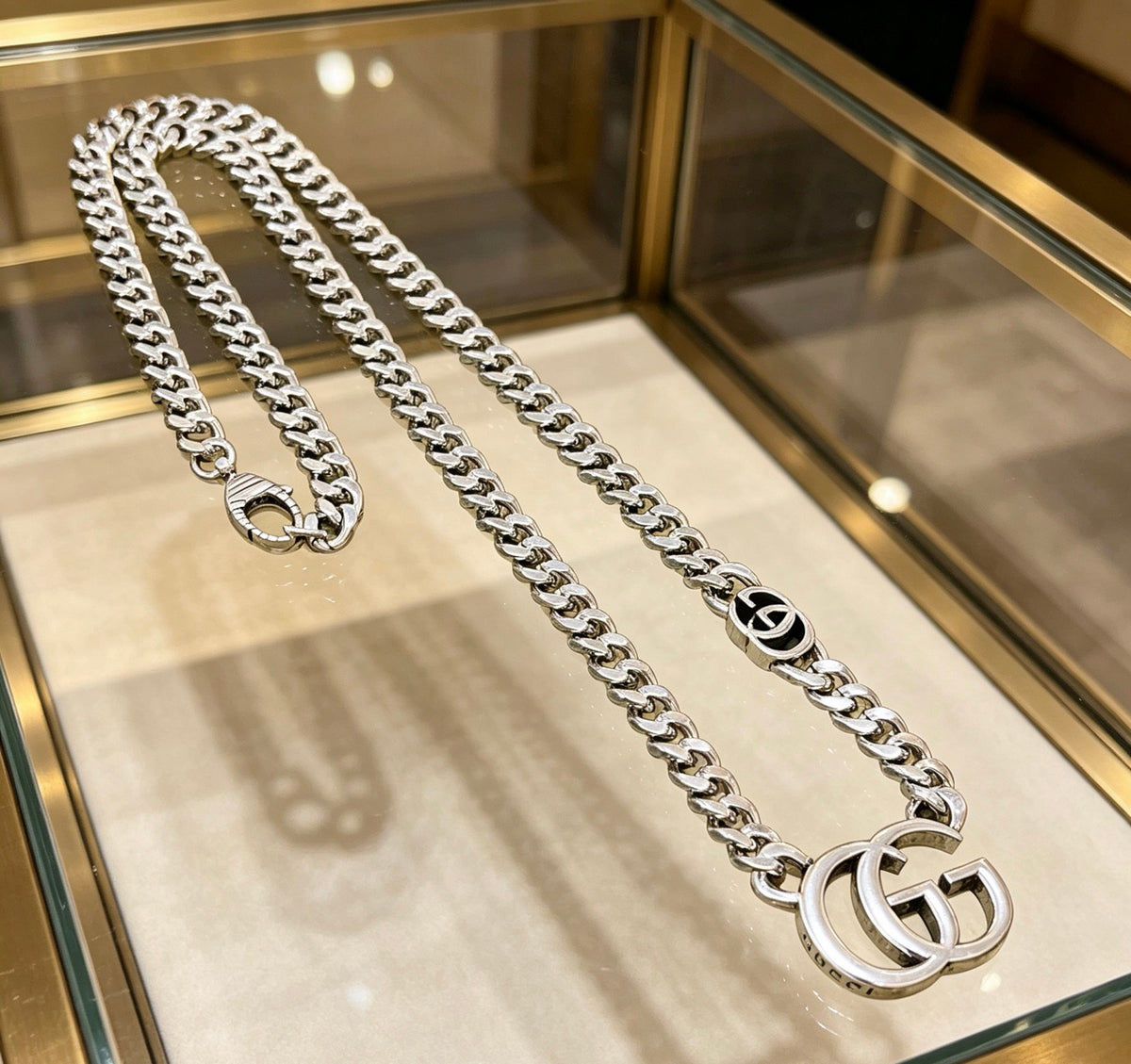 Double-G Emblem Pendant Necklace in Polished Metal-Tone – Vintage Detail – Design 041 close-up detail
