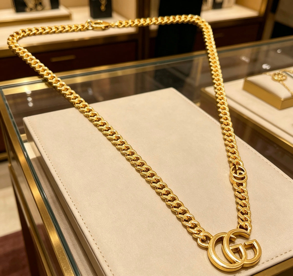 Double-G Emblem Pendant Necklace in Polished Metal-Tone – Vintage Detail – Design 040 close-up detail