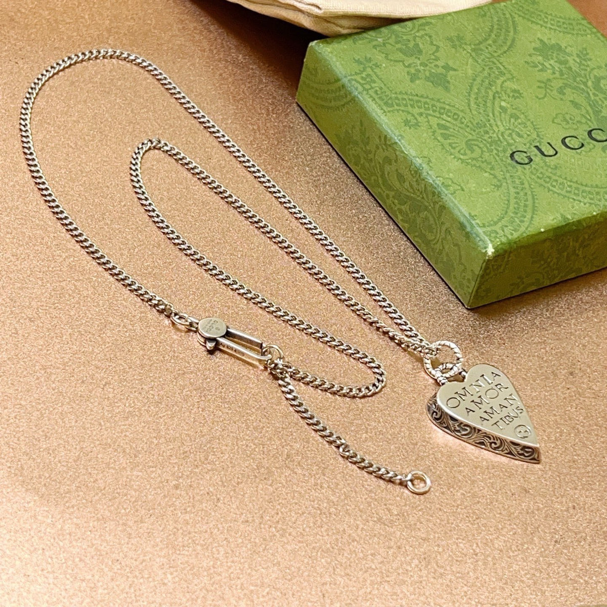 Double-G Emblem Pendant Necklace in Polished Metal-Tone – Design 111 close-up detail