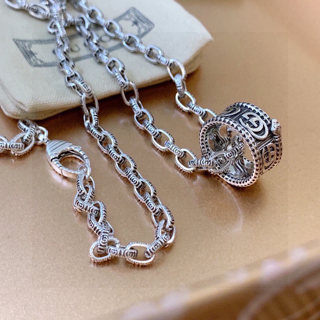 Double-G Emblem Pendant Necklace in Polished Metal-Tone – Design 109 detail view