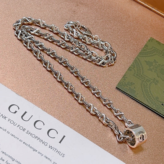 Double-G Emblem Pendant Necklace in Polished Metal-Tone – Vintage Detail – Design 012 main product view