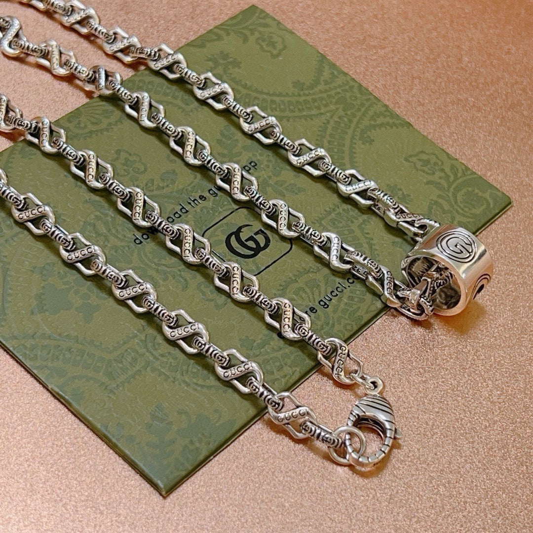 Double-G Emblem Pendant Necklace in Polished Metal-Tone – Vintage Detail – Design 012 front product view