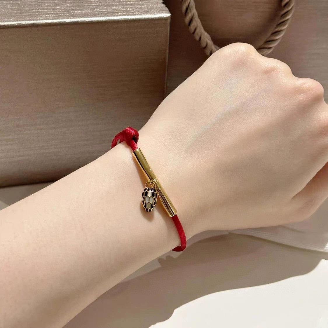 Red Cord Braided Bracelet in Polished Metal-Tone – Red Cord Detail – Design 002 detail view