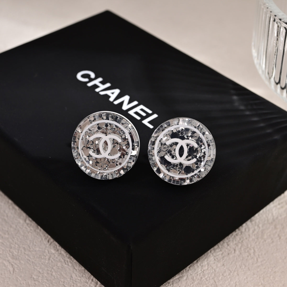 Signature Emblem Stud Earrings in Polished Metal-Tone – Design 021 detail view
