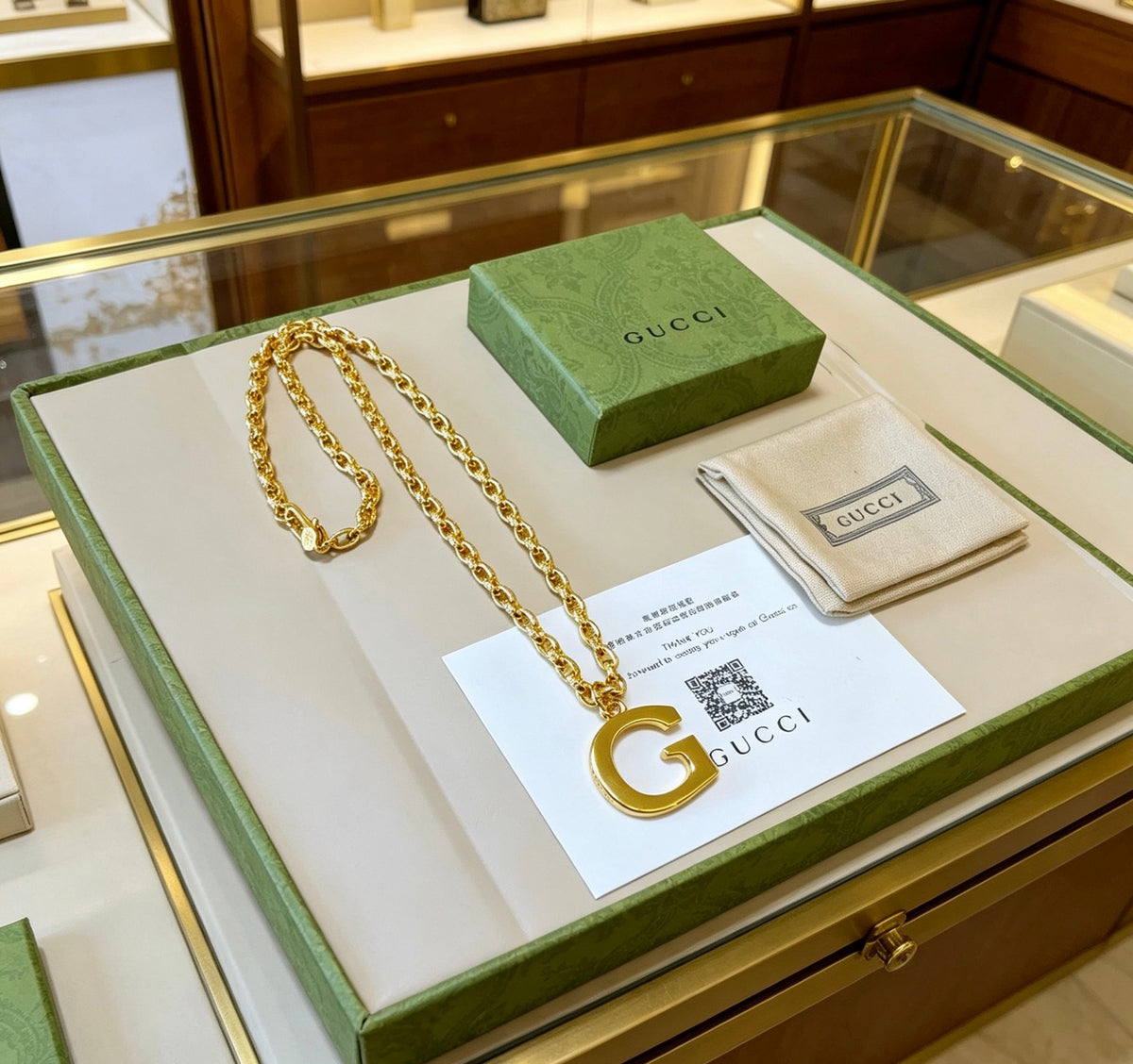 Double-G Emblem Pendant Necklace in Gold-Tone – Design 006 side detail
