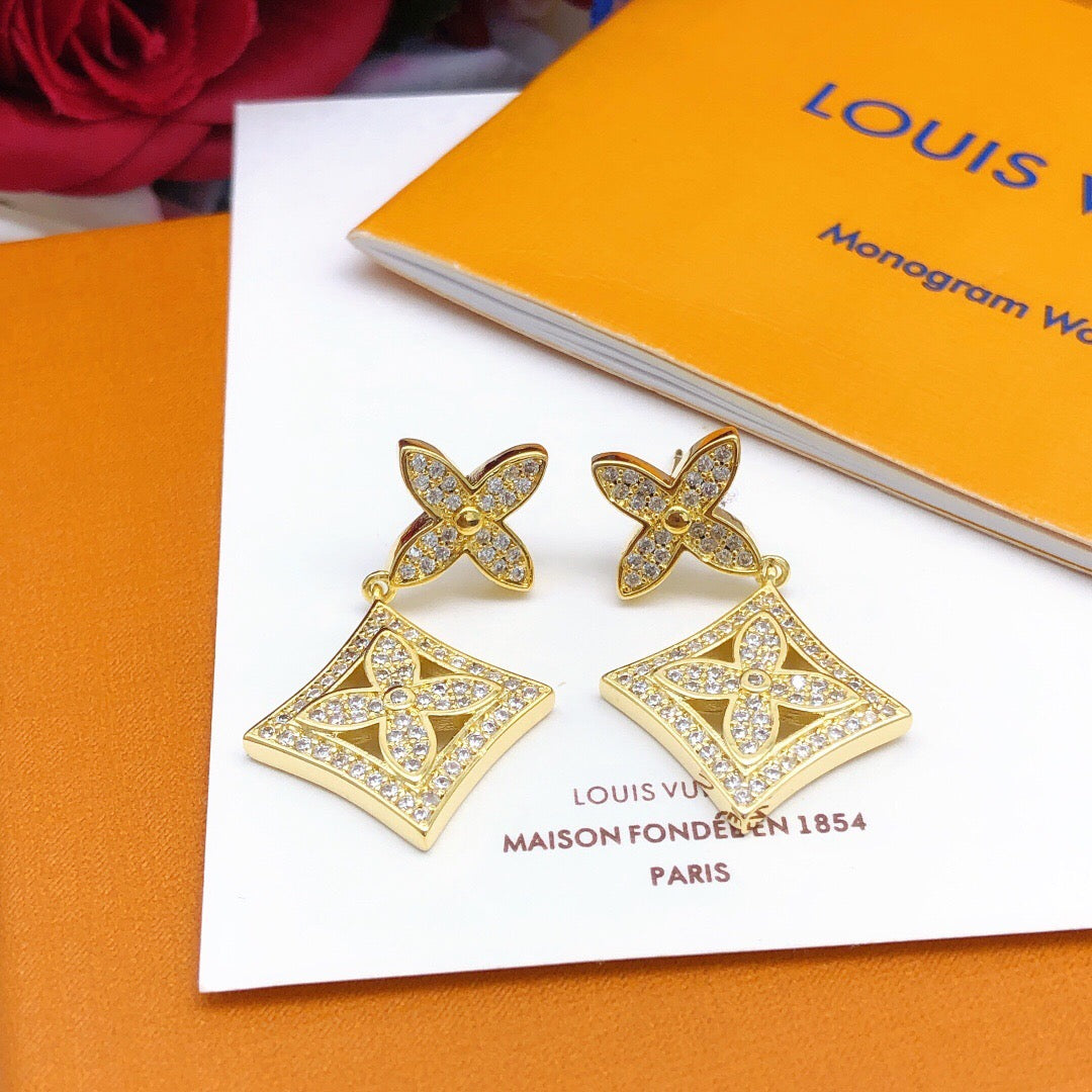 Geometric Emblem Pendant in Gold-Tone close-up detail