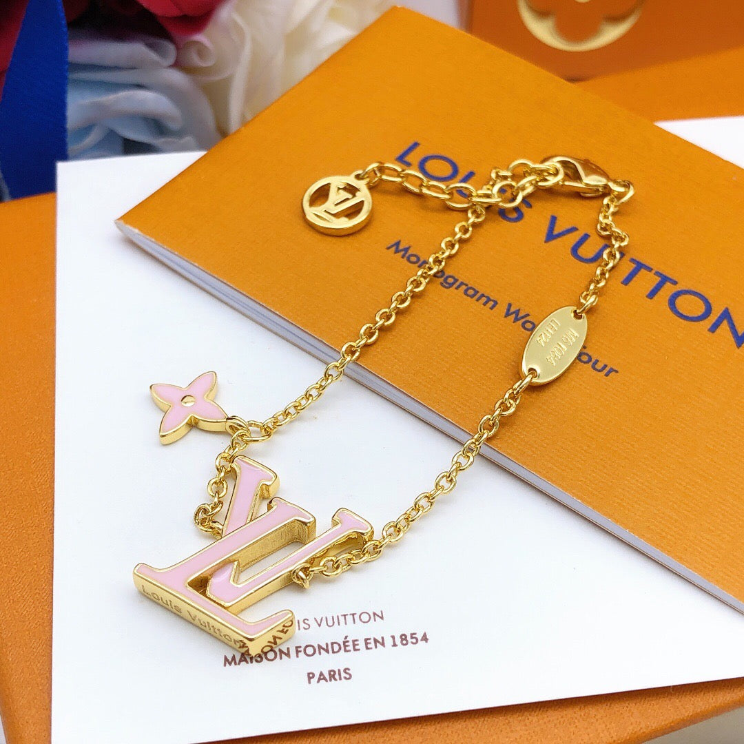 Geometric Emblem Bracelet in Gold-Tone – Pink Detail – Design 003 styled product view