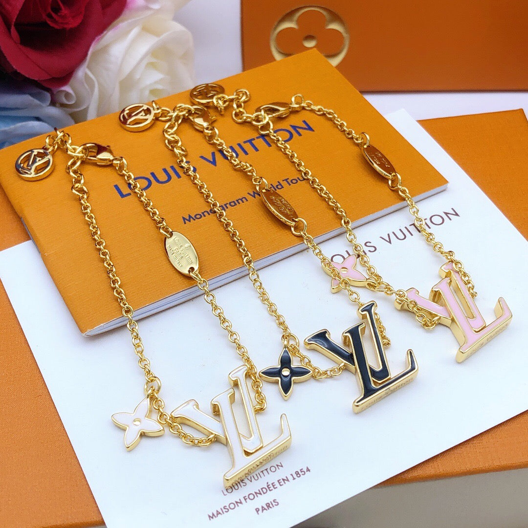 Geometric Emblem Bracelet in Gold-Tone – Pink Detail – Design 003 front product view
