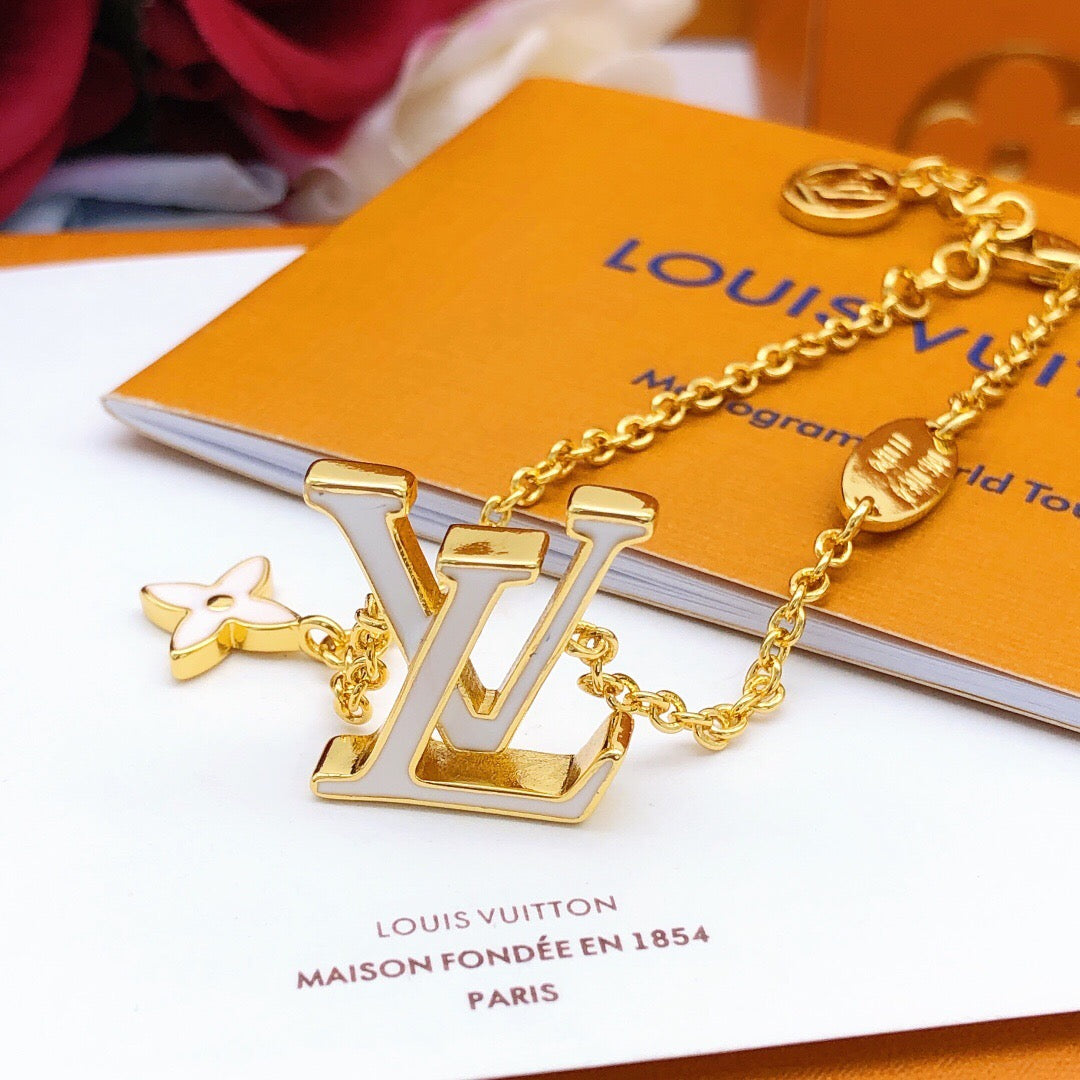 Geometric Emblem Bracelet in Gold-Tone – White Detail side detail