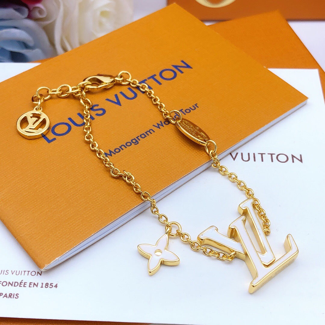 Geometric Emblem Bracelet in Gold-Tone – White Detail styled product view
