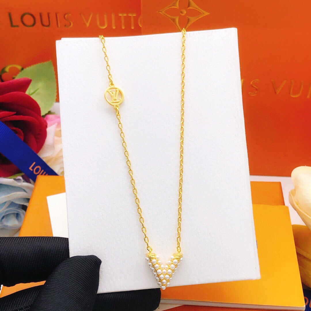 Geometric Emblem Pendant Necklace in Gold-Tone – Pearl Detail styled product view