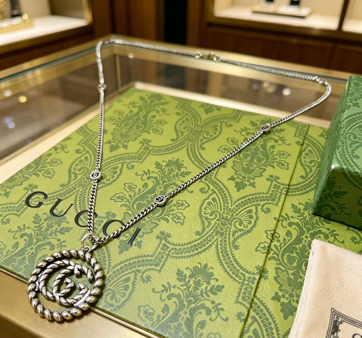 Double-G Emblem Pendant Necklace in Silver-Tone – Vintage Detail – Design 007 styled product view