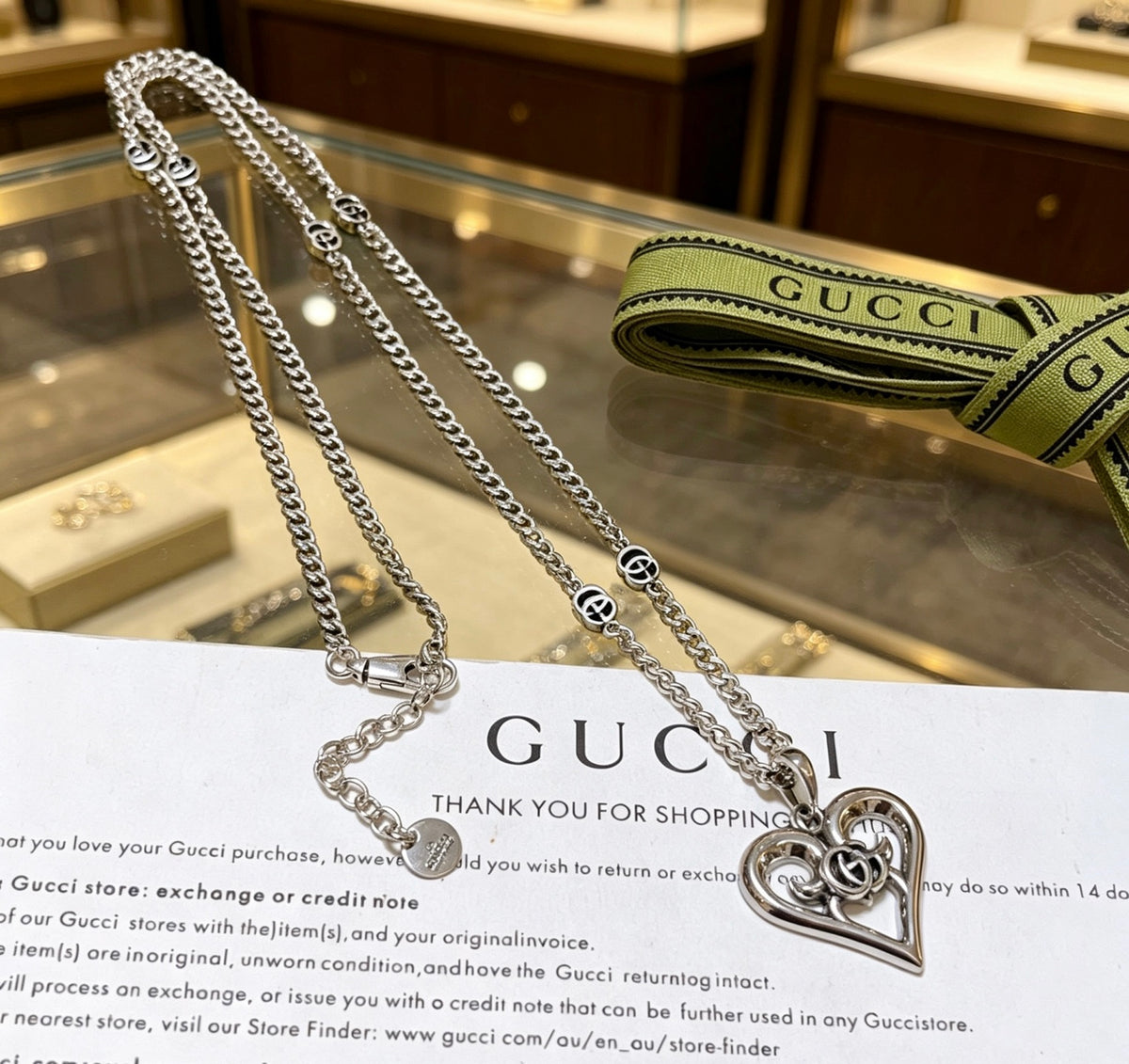Double-G Emblem Pendant Necklace in Polished Metal-Tone – Design 091 close-up detail