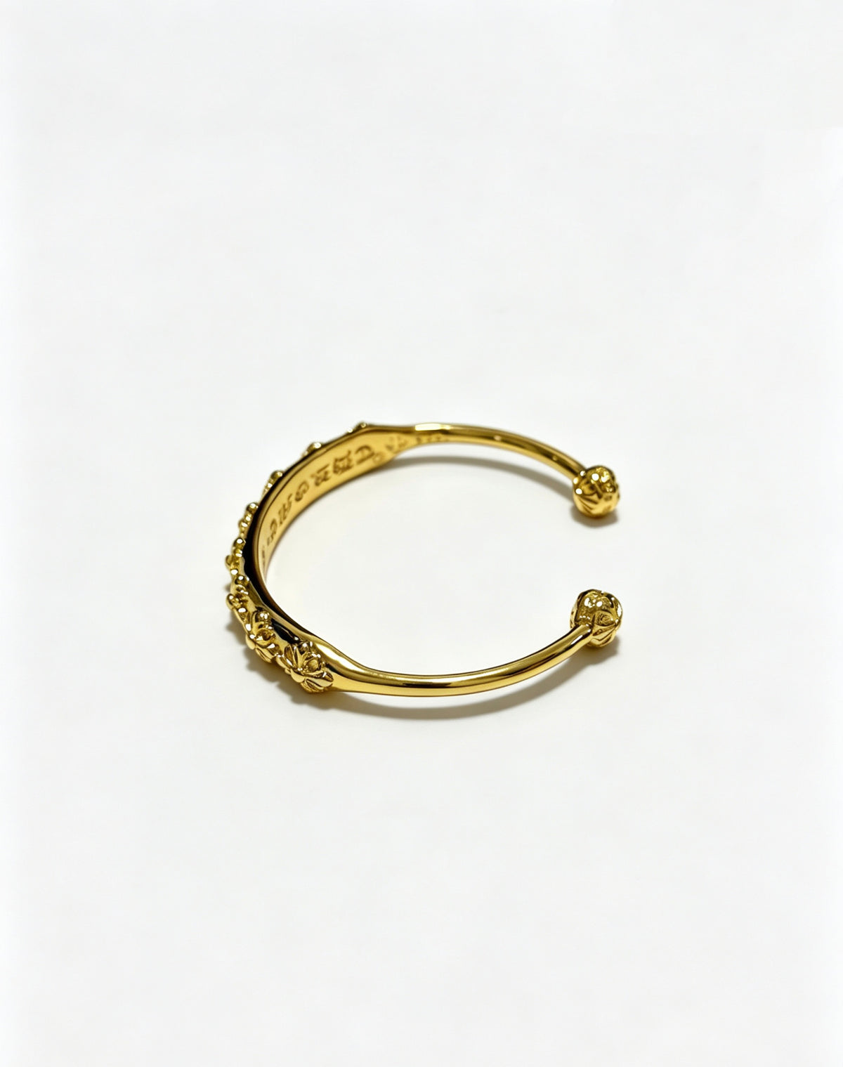 Signature Emblem Bangle in Polished Metal-Tone – Design 002 detail view