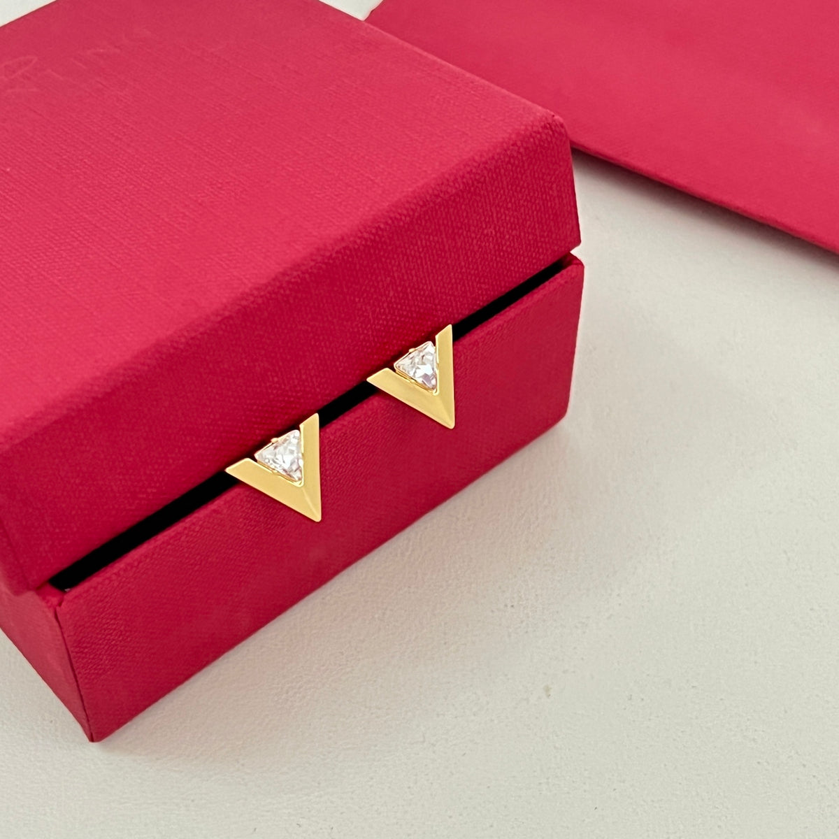 Signature Emblem Stud Earrings in Polished Metal-Tone – Design 01 side detail