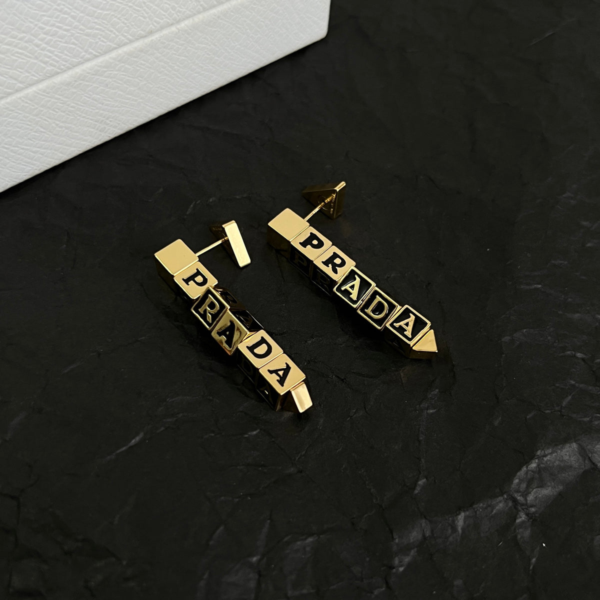 Triangle Stud Earrings in Polished Metal-Tone – Triangle Detail close-up view