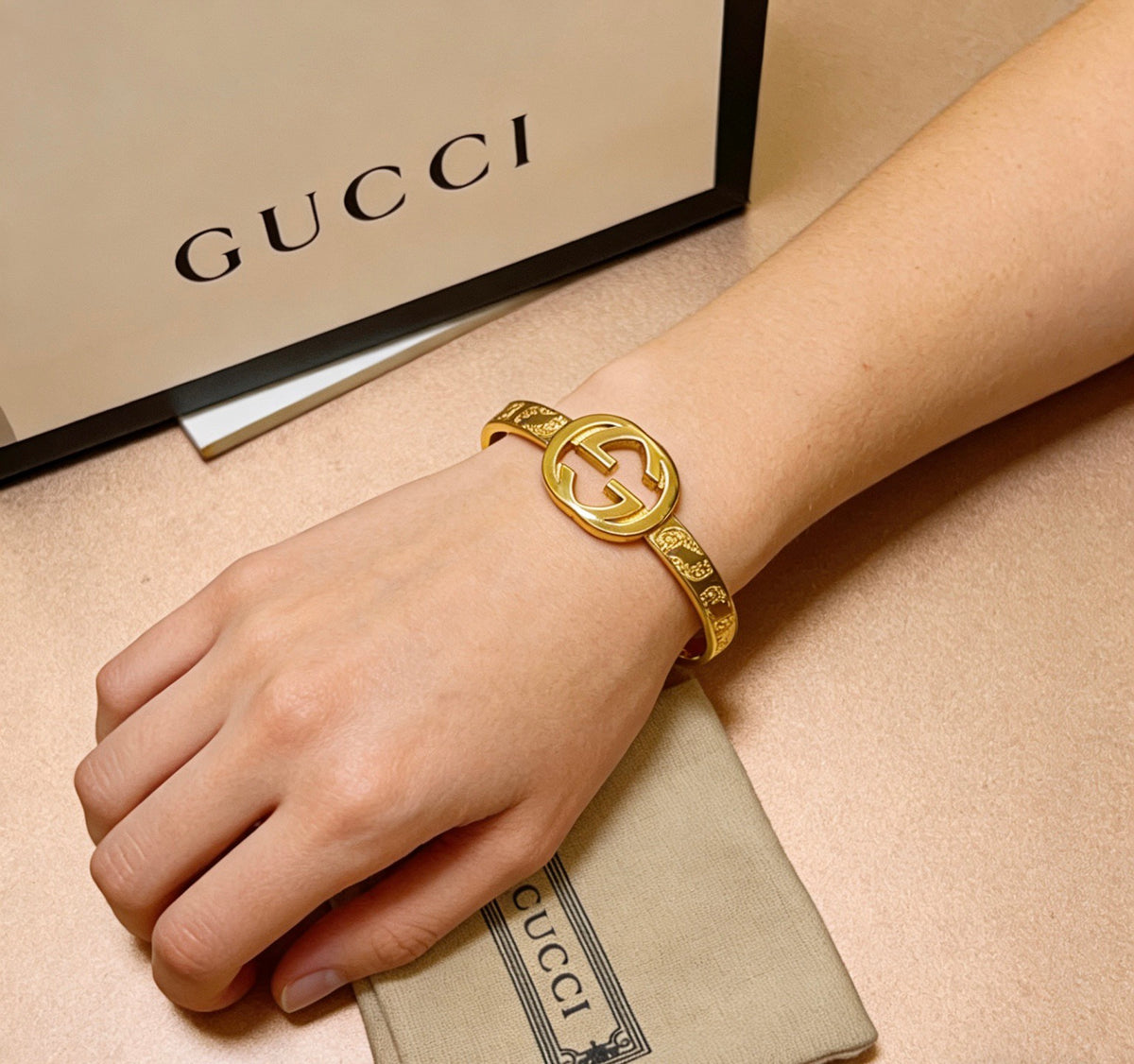 Double-G Emblem Bangle in Polished Metal-Tone – Design 012 styled product view