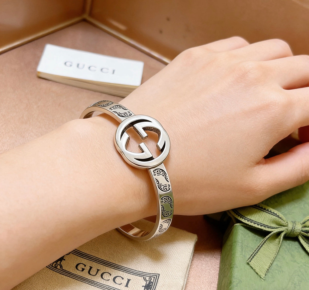 Double-G Emblem Bangle in Polished Metal-Tone – Design 003 styled product view