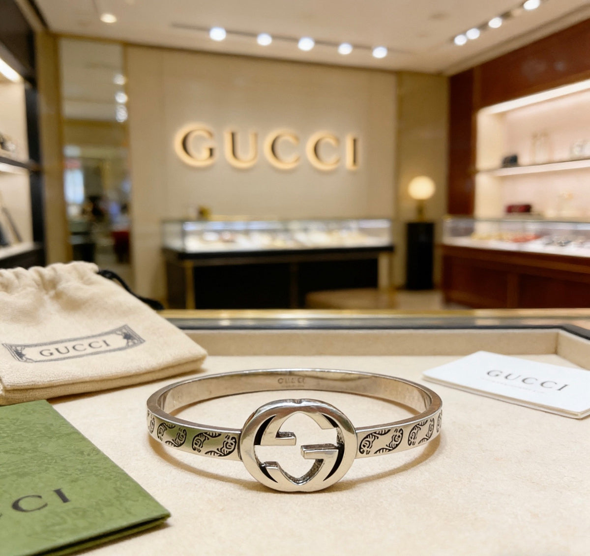 Double-G Emblem Bangle in Polished Metal-Tone – Design 003 close-up detail