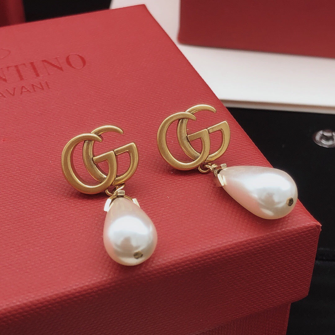 Geometric Emblem Stud Earrings in Gold-Tone – Design 001 front product view