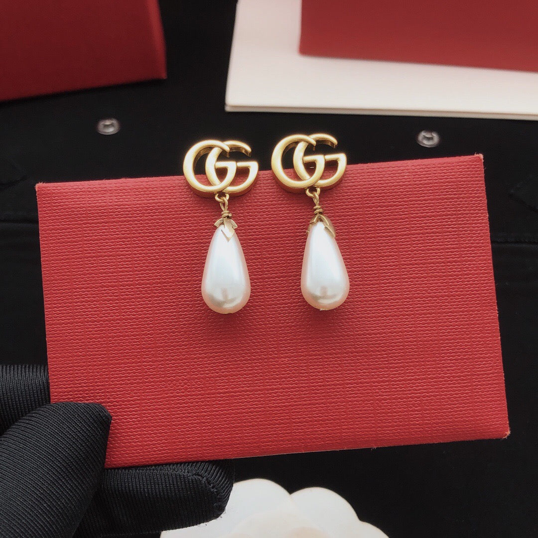 Geometric Emblem Stud Earrings in Gold-Tone – Design 001 front product view