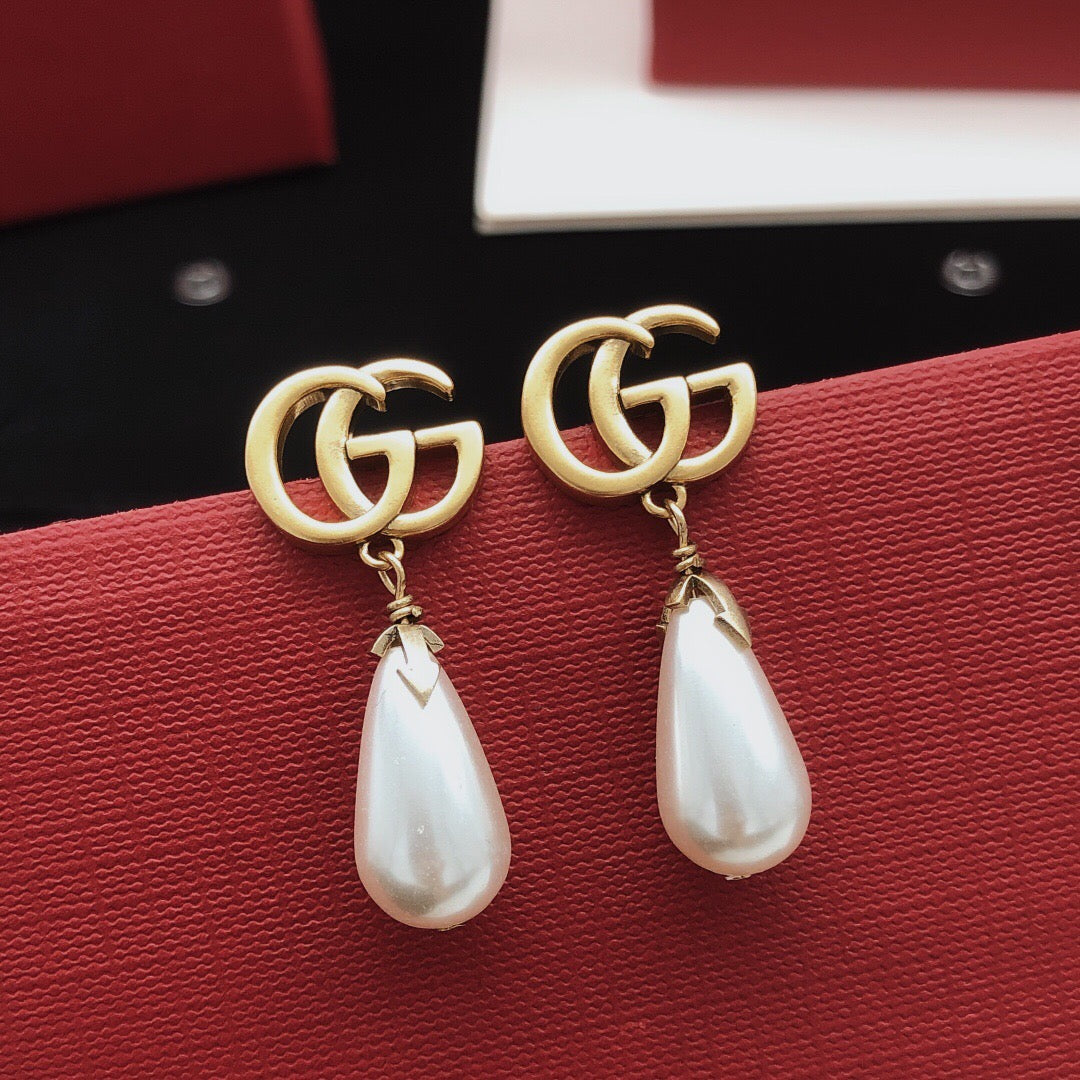 Geometric Emblem Stud Earrings in Gold-Tone – Design 001 styled product view