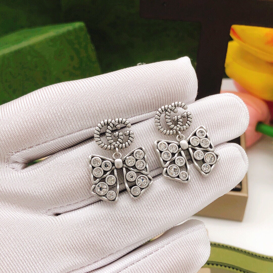 Double-G Emblem Statement Earrings in Silver-Tone – Design 001 styled product view