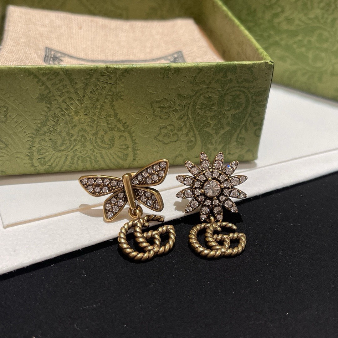 Double-G Emblem Stud Earrings in Polished Metal-Tone – Design 006 styled product view