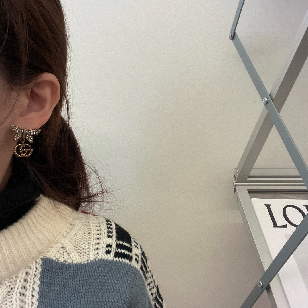Double-G Emblem Stud Earrings in Polished Metal-Tone – Design 006 front product view