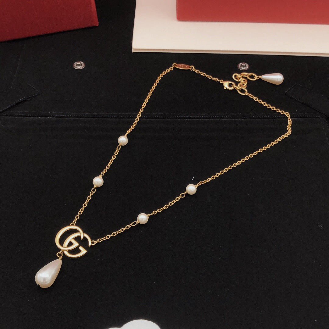 Double-G Emblem Pendant Necklace in Gold-Tone – Design 008 styled product view