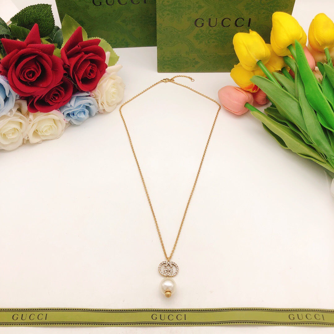 Double-G Emblem Pendant Necklace in Gold-Tone – Design 007 detail view