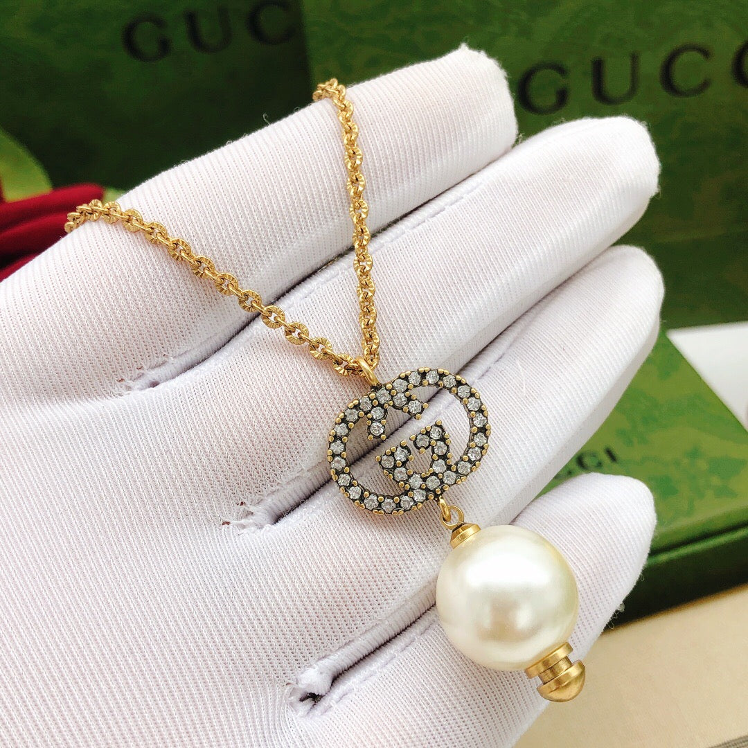 Double-G Emblem Pendant Necklace in Gold-Tone – Design 007 styled product view