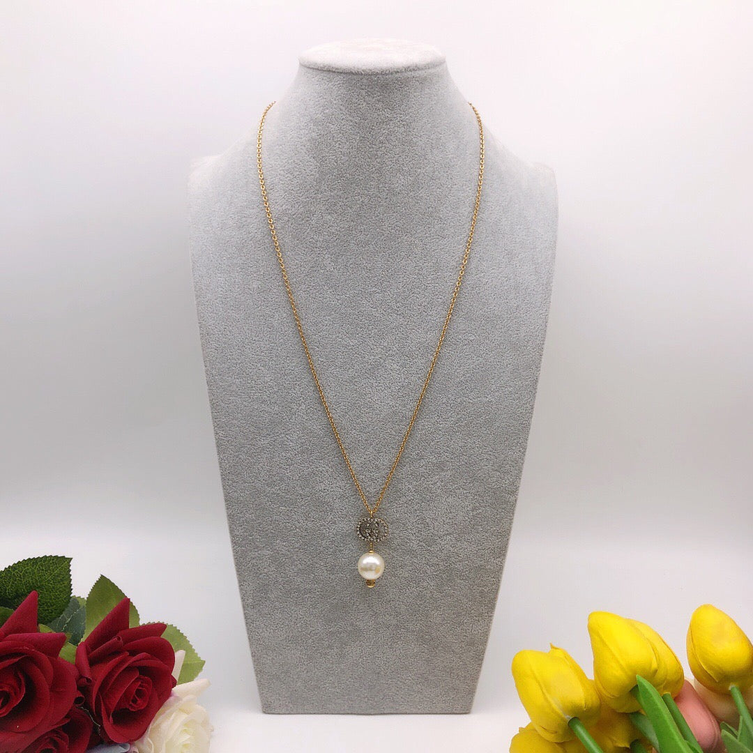 Double-G Emblem Pendant Necklace in Gold-Tone – Design 007 front product view