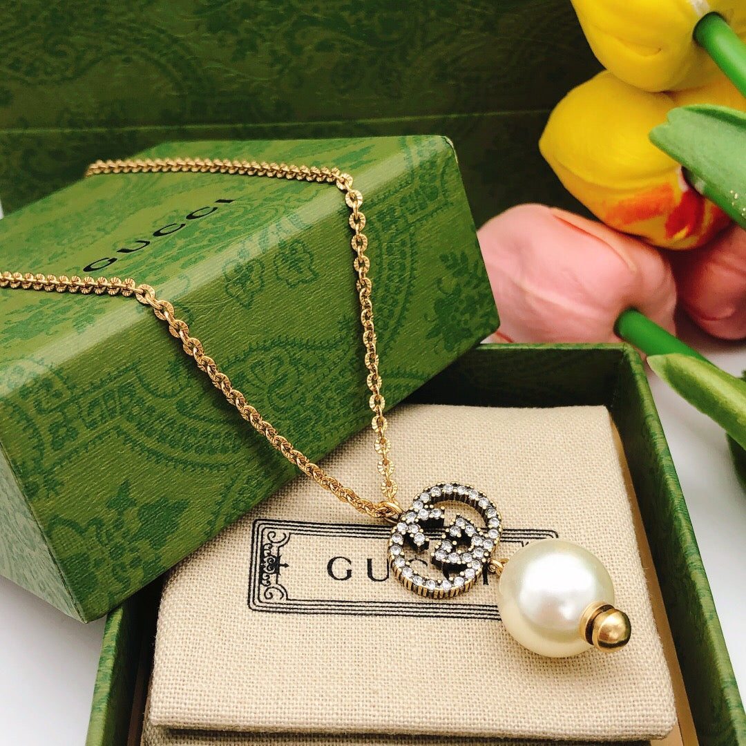 Double-G Emblem Pendant Necklace in Gold-Tone – Design 007 detail view