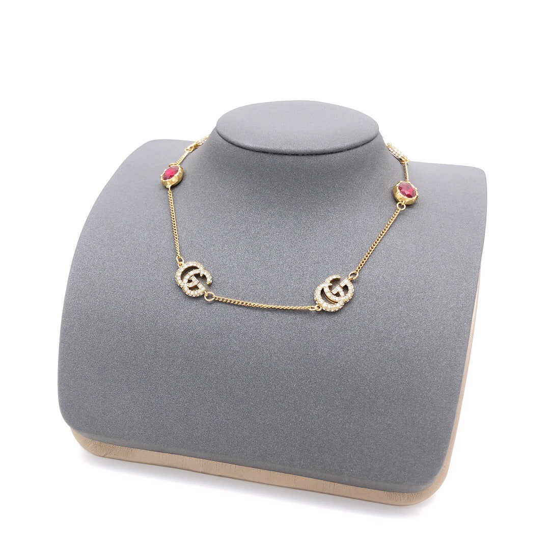 Geometric Emblem Pendant Necklace in Silver-Tone – Red Detail styled product view