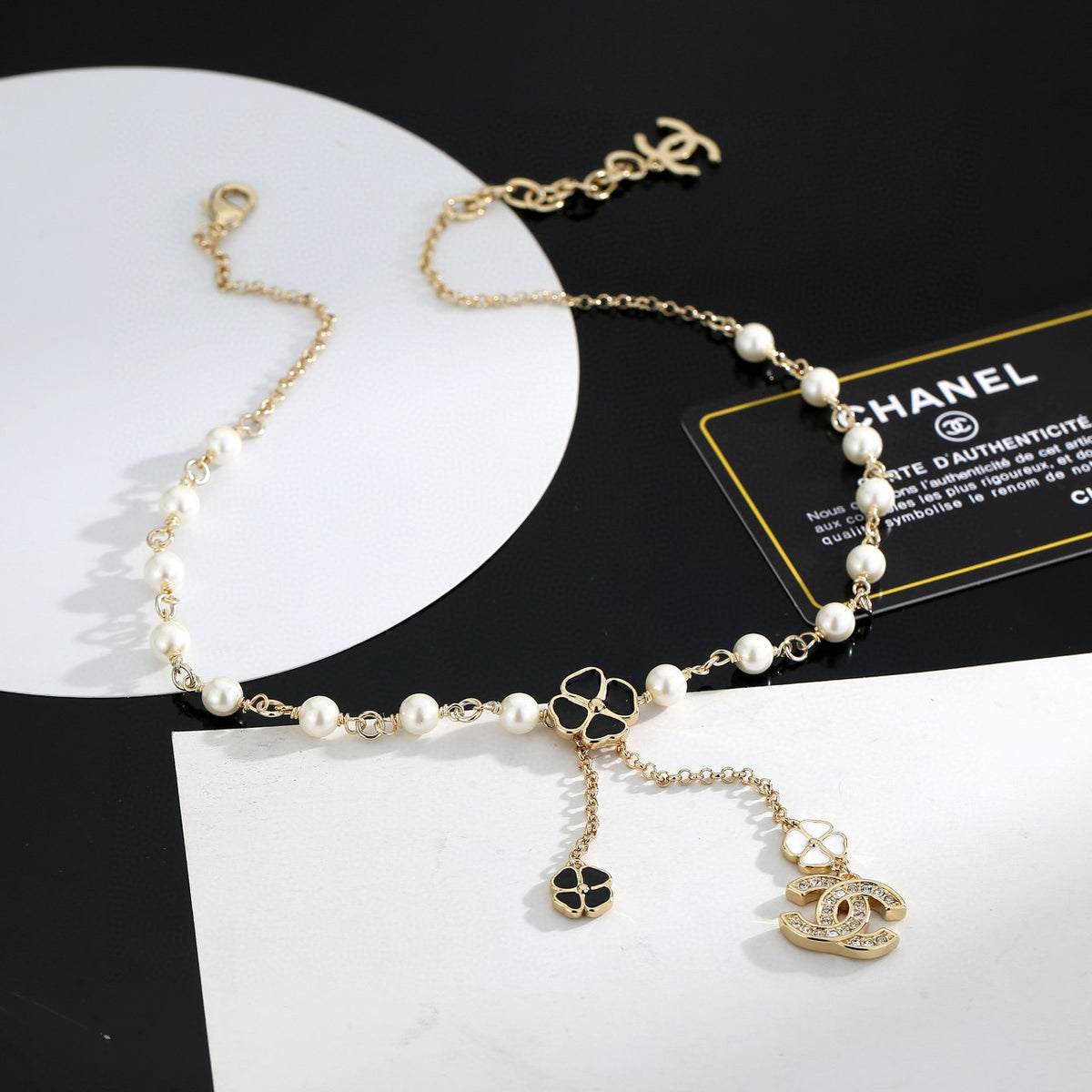 Double-C Emblem Pearl-Detail Pendant Necklace – Pearl Detail – Design 026 styled product view