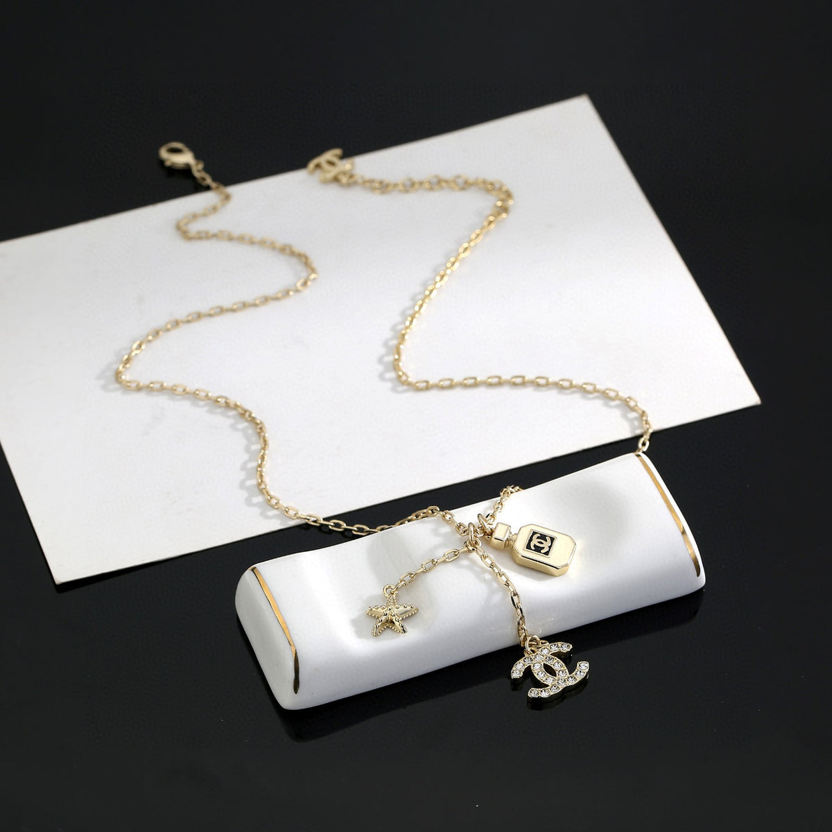 Double-C Emblem Pendant Necklace in Polished Metal-Tone – Design 009 front product view