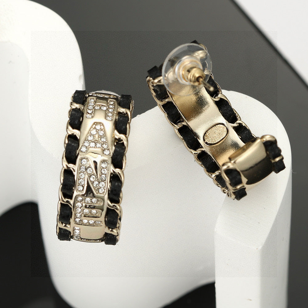 Signature Emblem Stud Earrings in Silver-Tone – Black Detail detail view