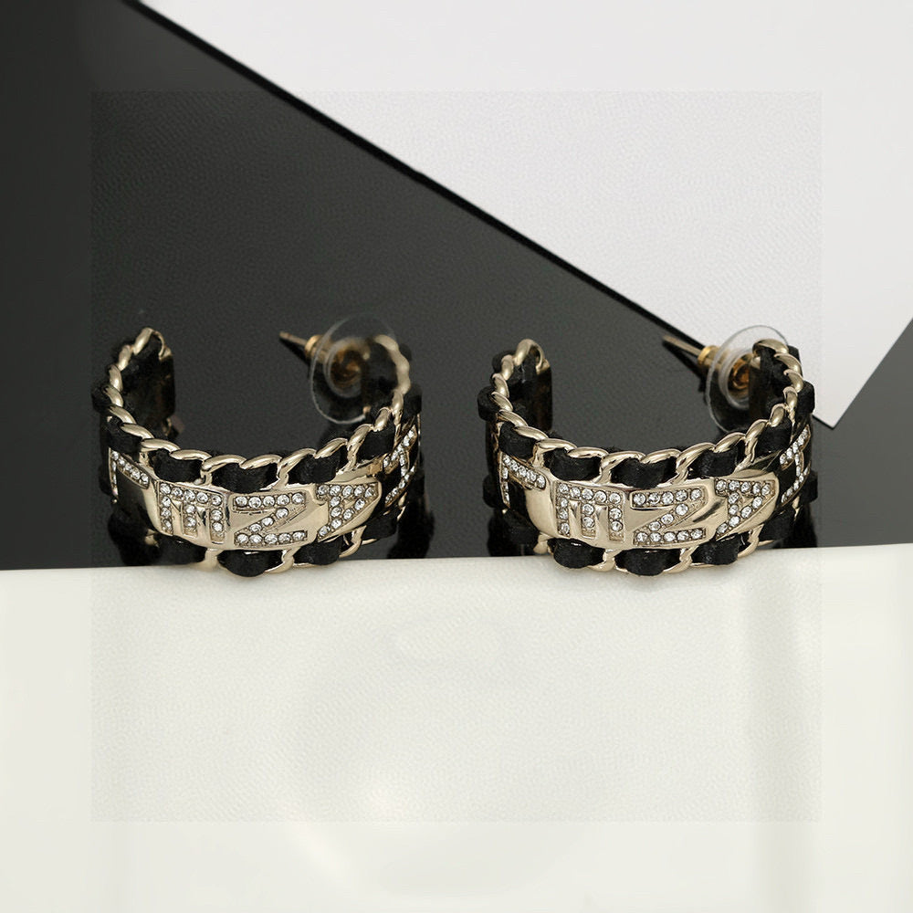 Signature Emblem Stud Earrings in Silver-Tone – Black Detail side detail